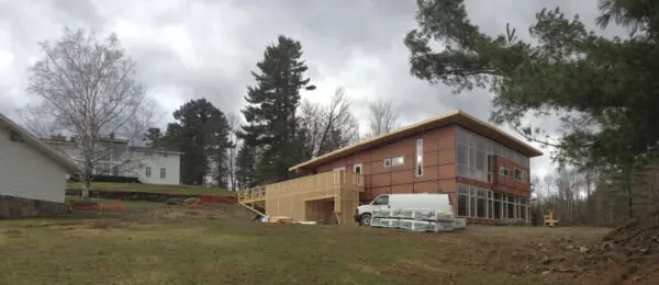 The new arts center in context, with the School’s main building in the background. We sited the arts center to align with a future theater addition to the right of the main building; the entry bridge will soon connect to steps leading up to the main theater.