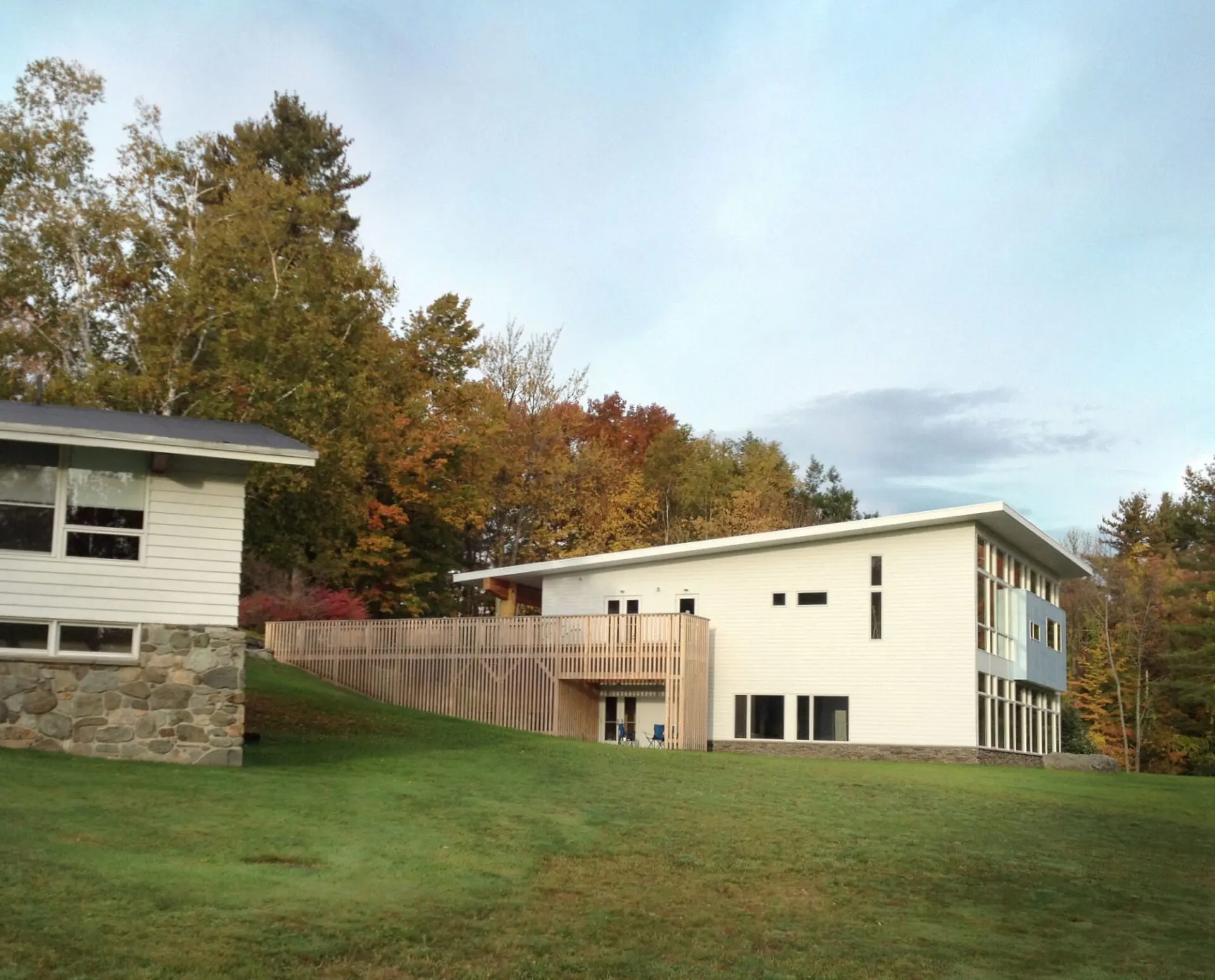 exterior of modern school with large lawn