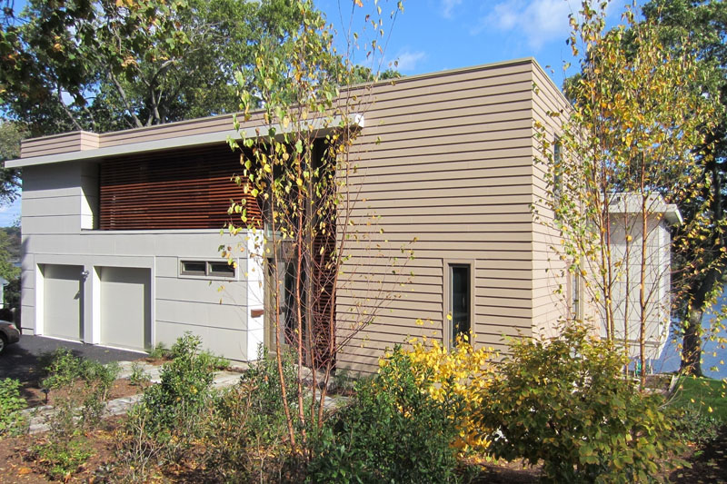 With time, the front yard will grow up to screen much of the front of the house, merging house and landscape. You can see additional information on Matthew’s design in our August 30, 2011 blog post.
